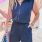 Power Play Quarter Zip Romper