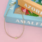 Tiny Gold Heartbeat Necklace