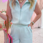 Power Play Quarter Zip Romper